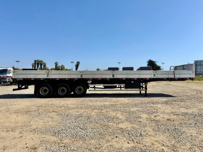 2019 Semirremolque Randon Rampla Plana 13.5 m con barandas y piñas - Imagen 5